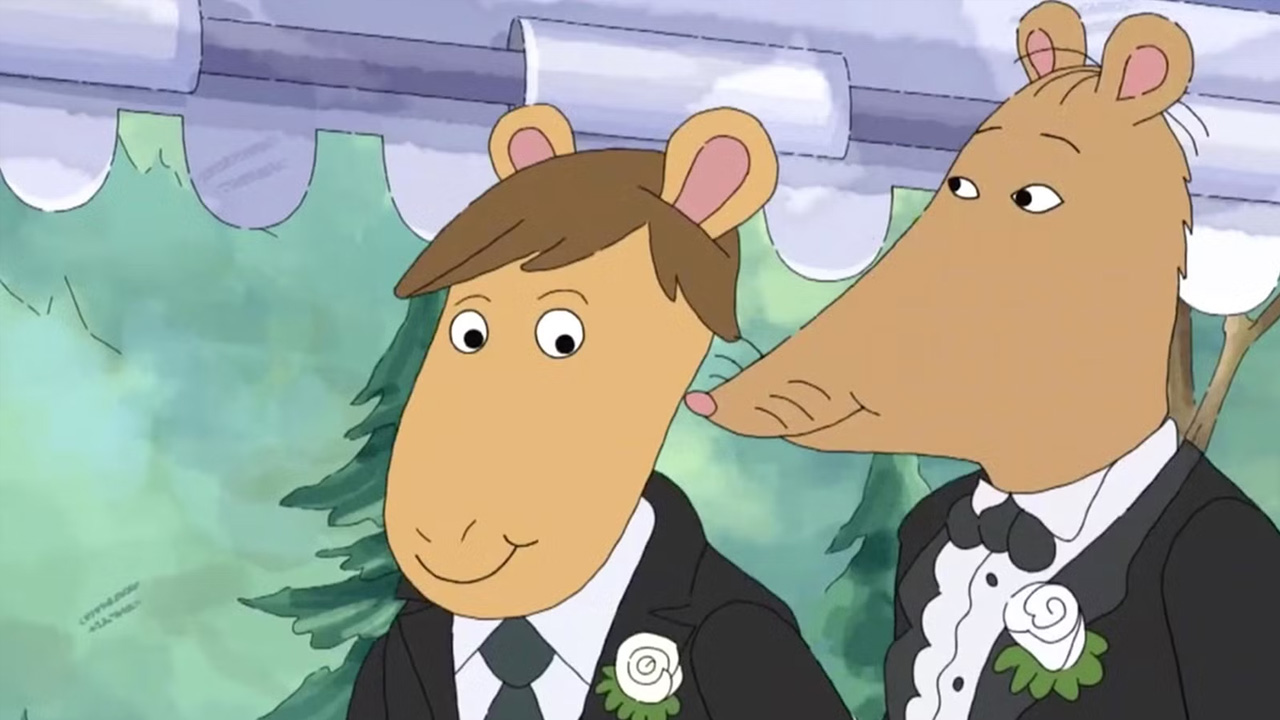 Arthur's teacher, Mr. Ratburn with his fiancé Patrick dressed in formal attire.