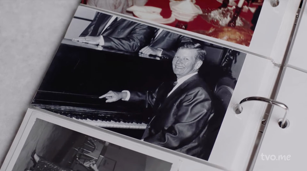 Black-and-white photograph of Billy Tipton seated at a piano in a photo album.